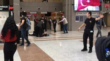 Bir anda koşmaya başlayan şahıs, polis ve güvenlik görevlilerini alarma geçirdi.